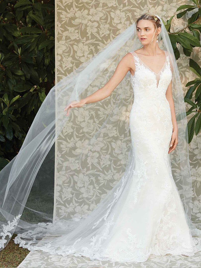 plunging v neckline fit and flare lace wedding gown